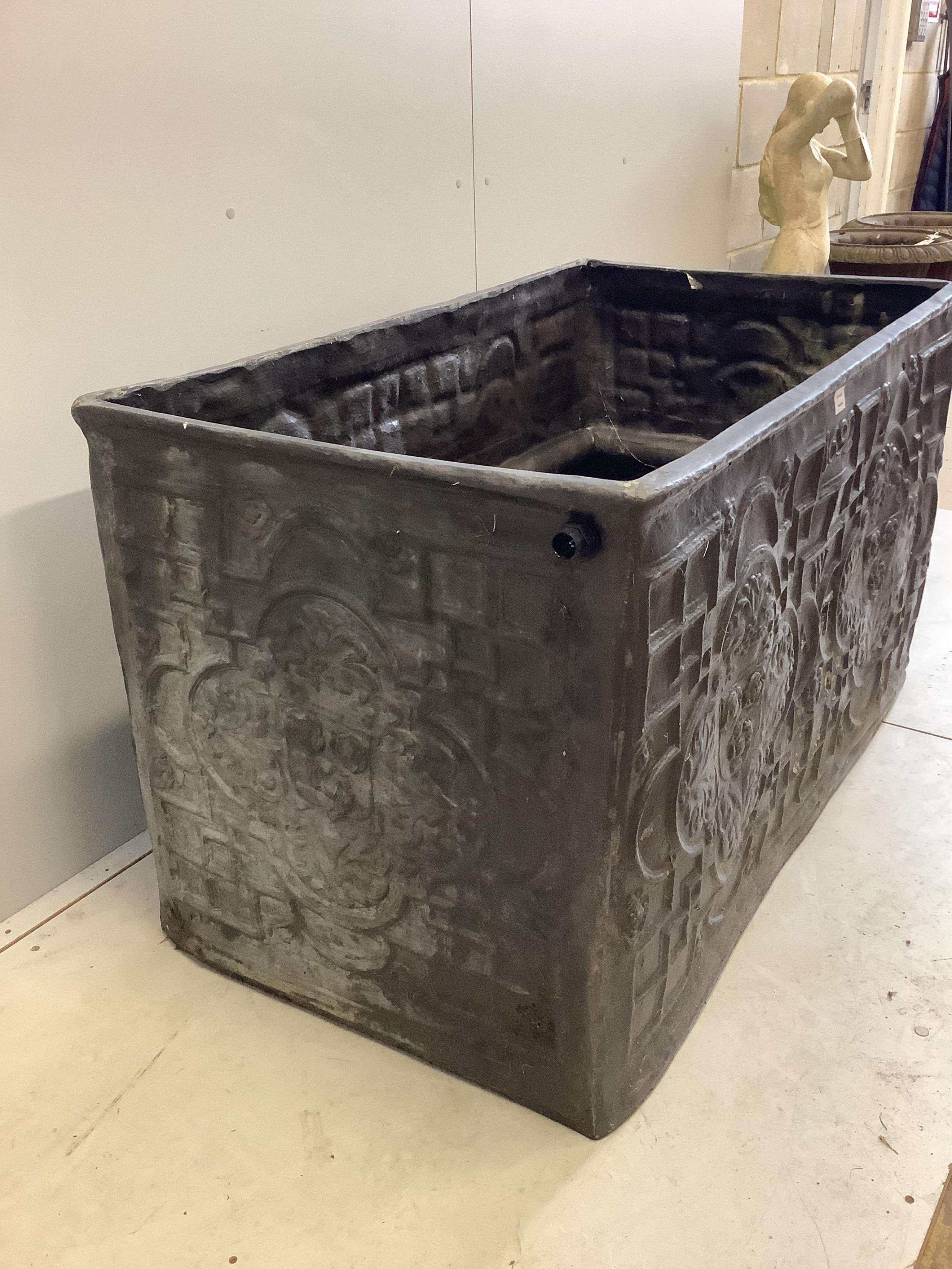 A rectangular faux lead water cistern, width 124cm, depth 71cm, height 74cm. Condition - good